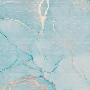 Photo of Teal And Ivory Abstract Washable Area Rug With UV Protection