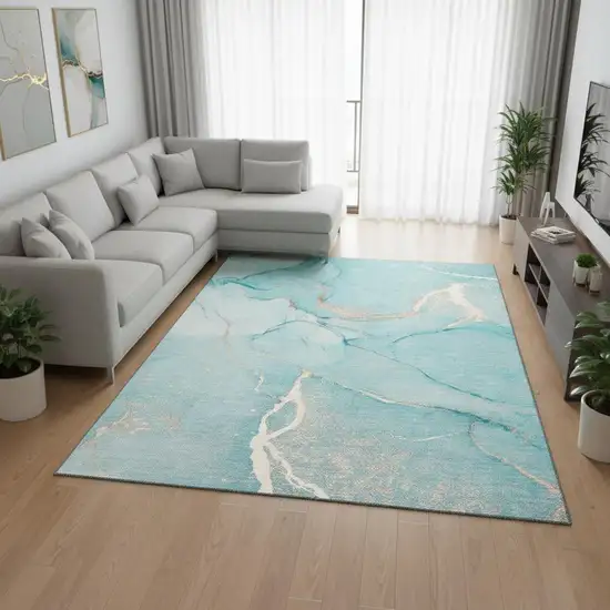 Teal And Ivory Abstract Washable Area Rug With UV Protection Photo 1