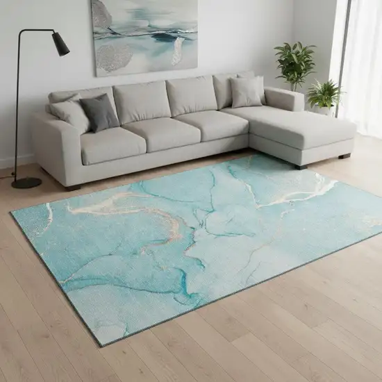 Teal And Ivory Abstract Washable Area Rug With UV Protection Photo 1
