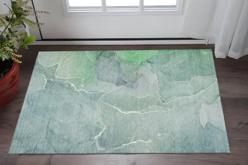 Teal And Ivory Abstract Washable Area Rug With UV Protection Photo 2