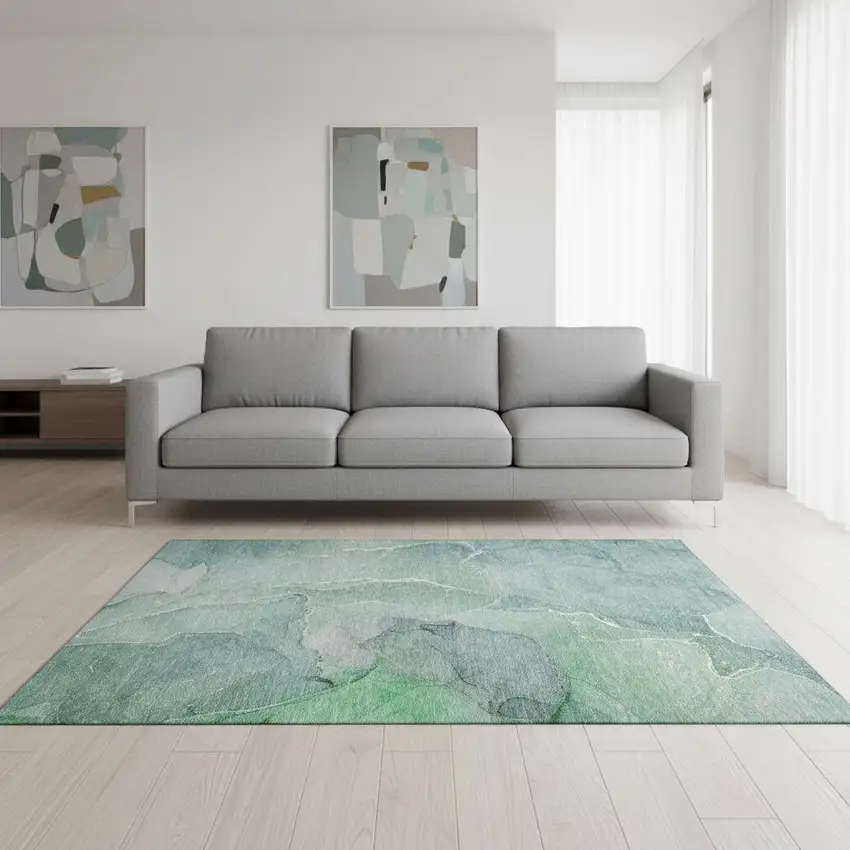 Teal And Ivory Abstract Washable Area Rug With UV Protection Photo 1