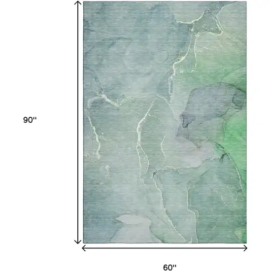 Teal And Ivory Abstract Washable Area Rug With UV Protection Photo 3