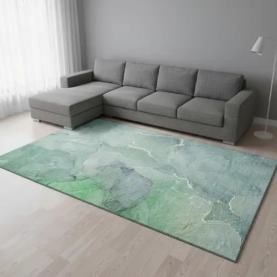 Teal And Ivory Abstract Washable Area Rug With UV Protection Photo 1
