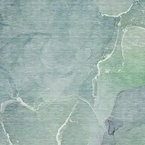 Photo of Teal And Ivory Abstract Washable Area Rug With UV Protection