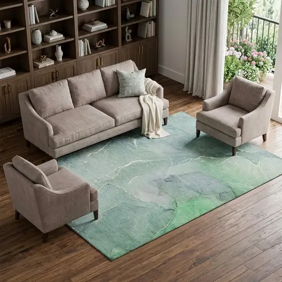 Teal And Ivory Abstract Washable Area Rug With UV Protection Photo 1