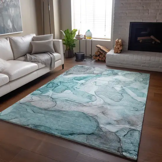 Teal And Ivory Abstract Washable Area Rug With UV Protection Photo 6