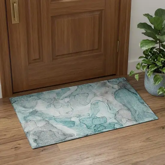 Teal And Ivory Abstract Washable Area Rug With UV Protection Photo 1