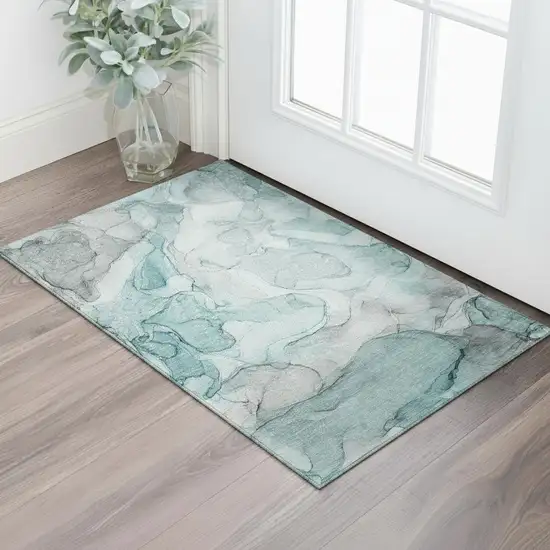 Teal And Ivory Abstract Washable Area Rug With UV Protection Photo 1