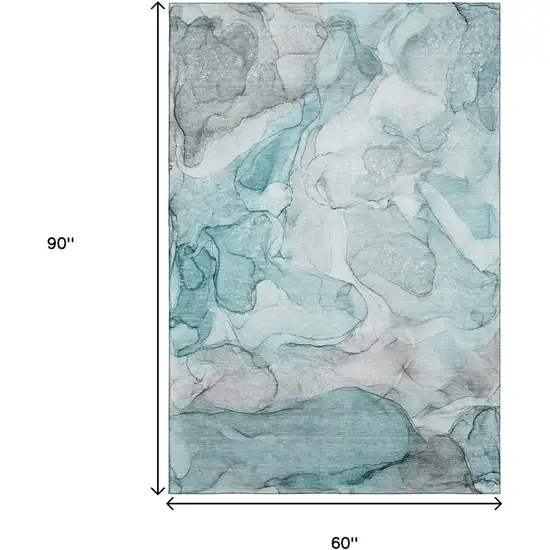 Teal And Ivory Abstract Washable Area Rug With UV Protection Photo 3