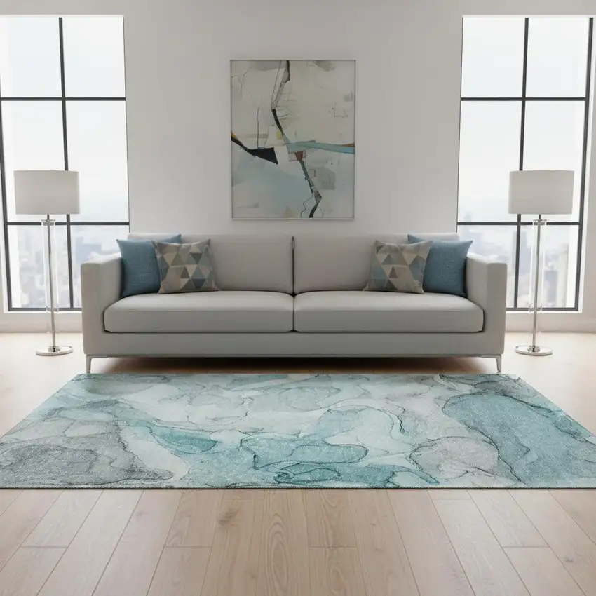 Teal And Ivory Abstract Washable Area Rug With UV Protection Photo 1