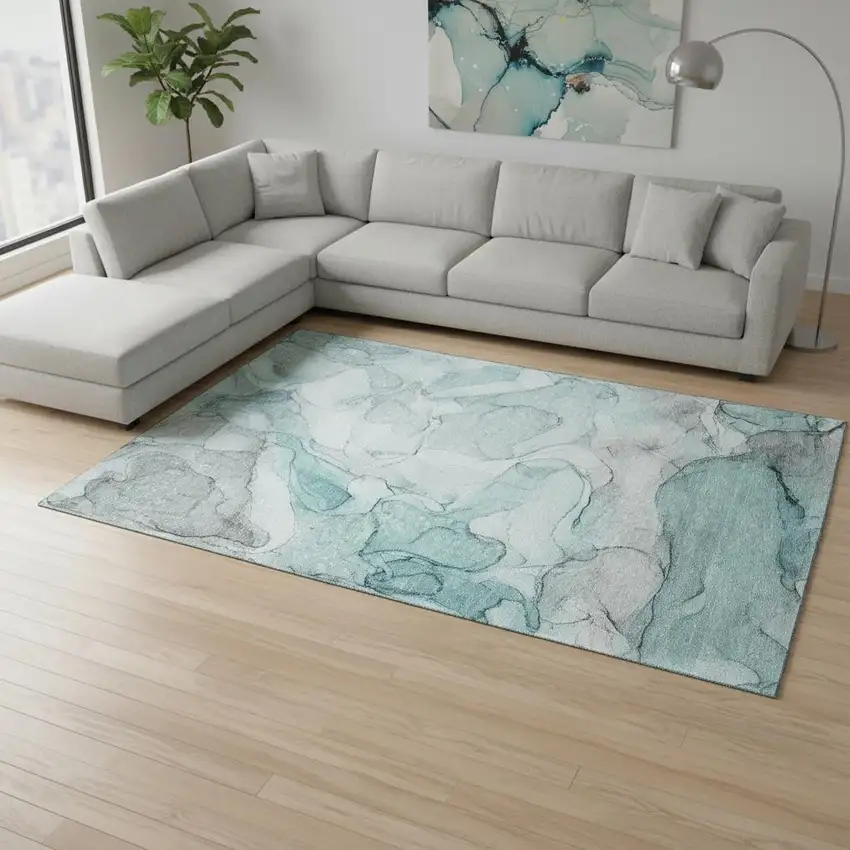 Teal And Ivory Abstract Washable Area Rug With UV Protection Photo 1