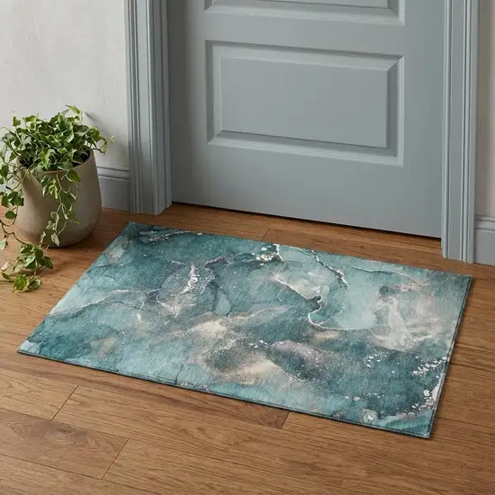 Teal And Ivory Abstract Washable Area Rug With UV Protection Photo 1