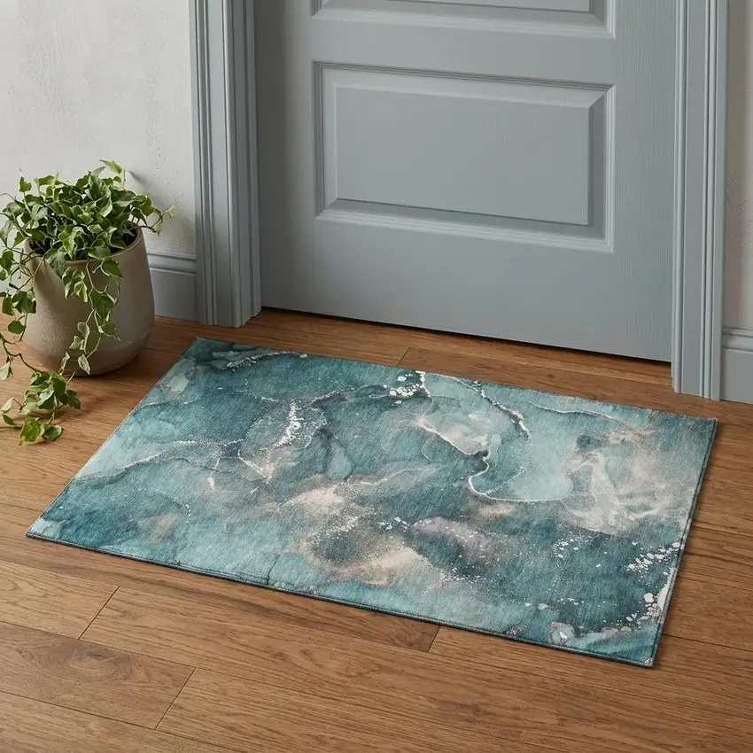 Teal And Ivory Abstract Washable Area Rug With UV Protection Photo 1