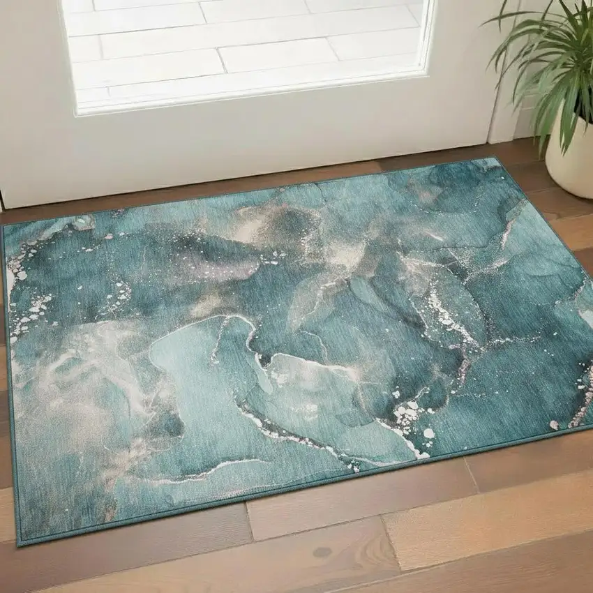 Teal And Ivory Abstract Washable Area Rug With UV Protection Photo 1