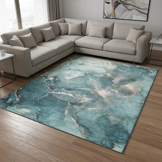 Teal And Ivory Abstract Washable Area Rug With UV Protection Photo 1