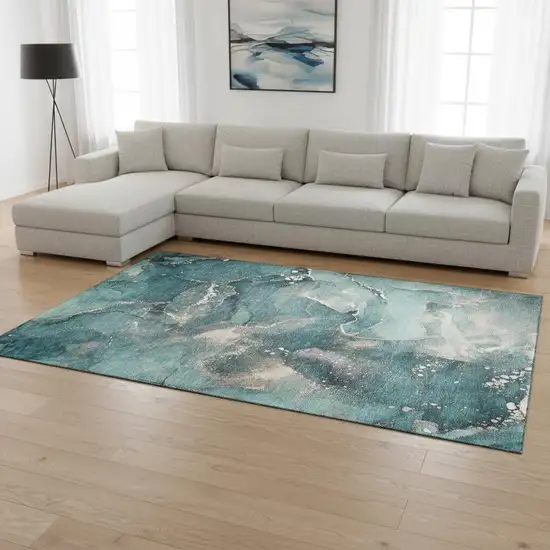 Teal And Ivory Abstract Washable Area Rug With UV Protection Photo 1