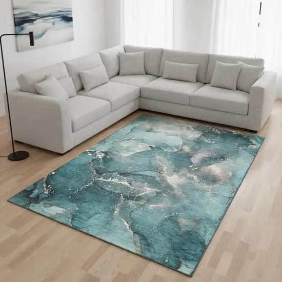 Teal And Ivory Abstract Washable Area Rug With UV Protection Photo 1