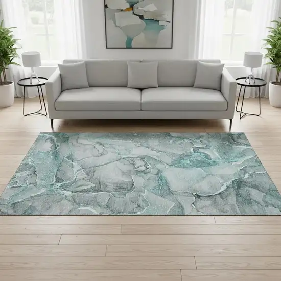 Teal And Ivory Abstract Washable Area Rug With UV Protection Photo 1
