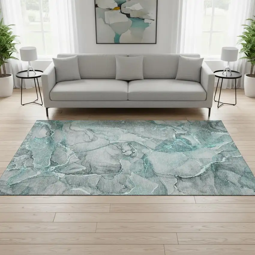 Teal And Ivory Abstract Washable Area Rug With UV Protection Photo 1
