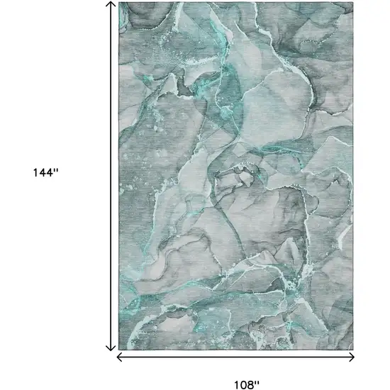 Teal And Ivory Abstract Washable Area Rug With UV Protection Photo 3