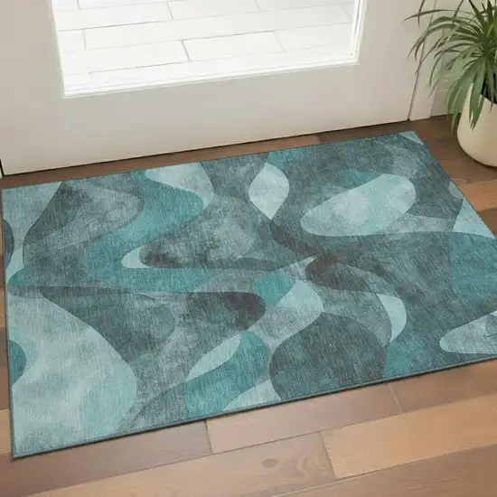 Teal And Ivory Abstract Washable Area Rug With UV Protection Photo 1