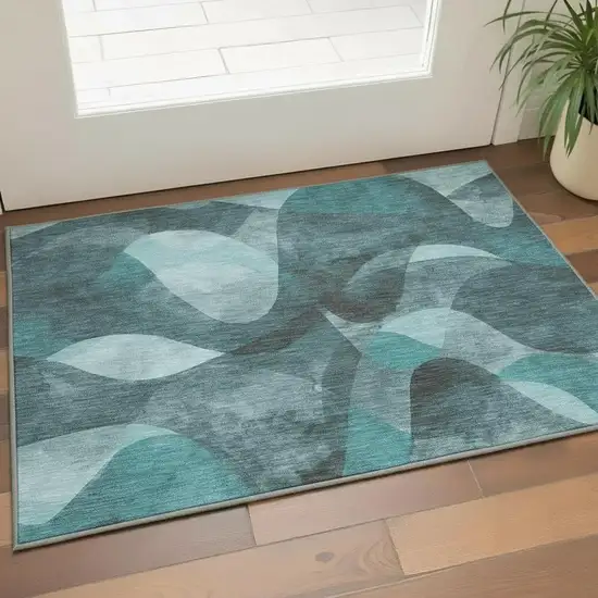 Teal And Ivory Abstract Washable Area Rug With UV Protection Photo 2