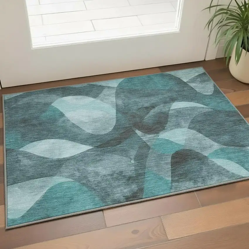 Teal And Ivory Abstract Washable Area Rug With UV Protection Photo 2
