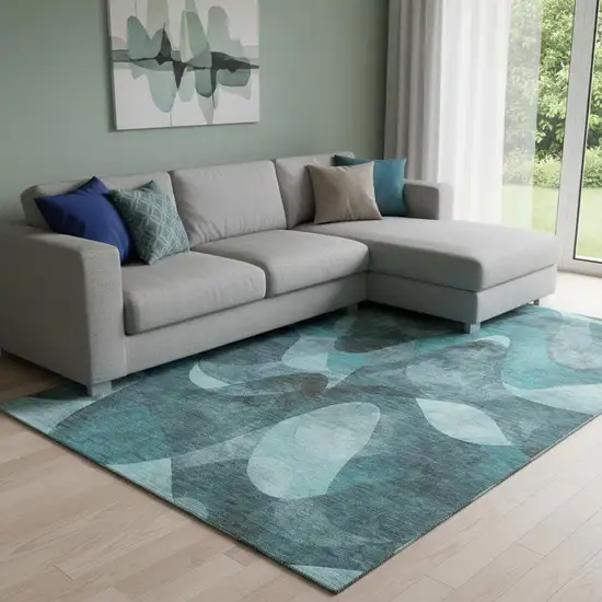 Teal And Ivory Abstract Washable Area Rug With UV Protection Photo 1