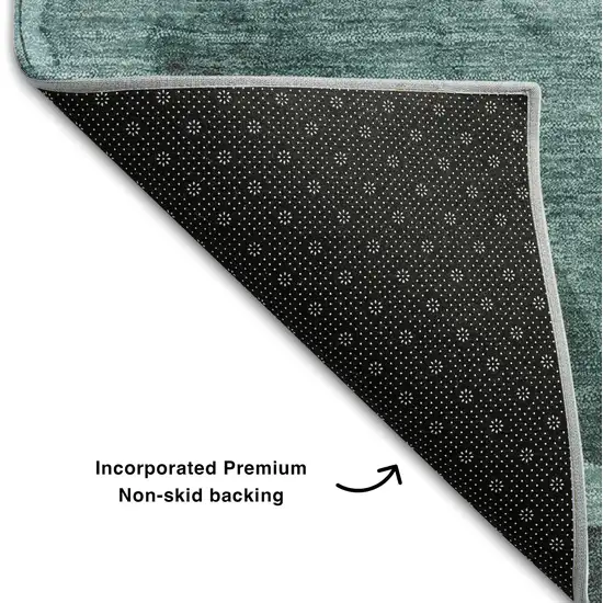 Teal And Ivory Abstract Washable Area Rug With UV Protection Photo 6