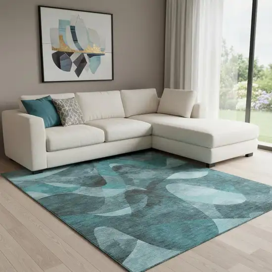 Teal And Ivory Abstract Washable Area Rug With UV Protection Photo 1