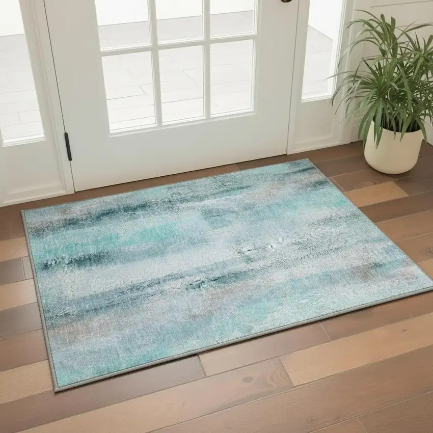 Teal And Ivory Abstract Washable Area Rug With UV Protection Photo 2