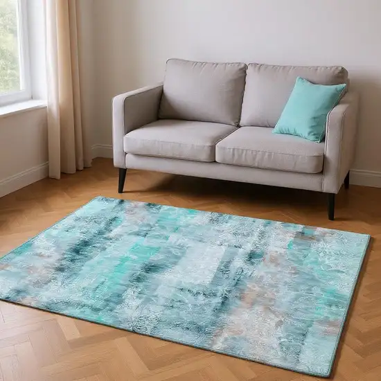 Teal And Ivory Abstract Washable Area Rug With UV Protection Photo 2