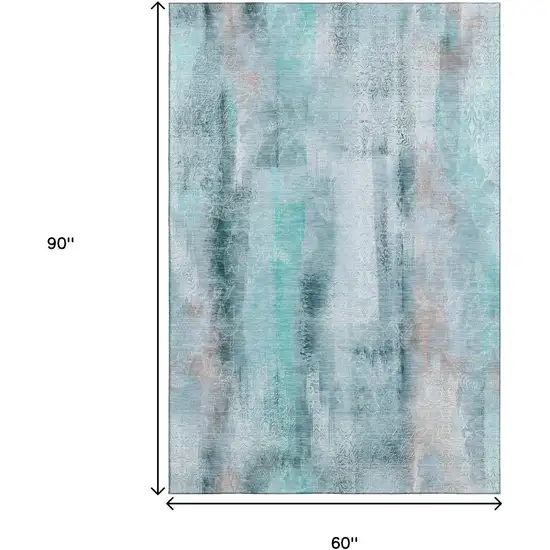 Teal And Ivory Abstract Washable Area Rug With UV Protection Photo 3