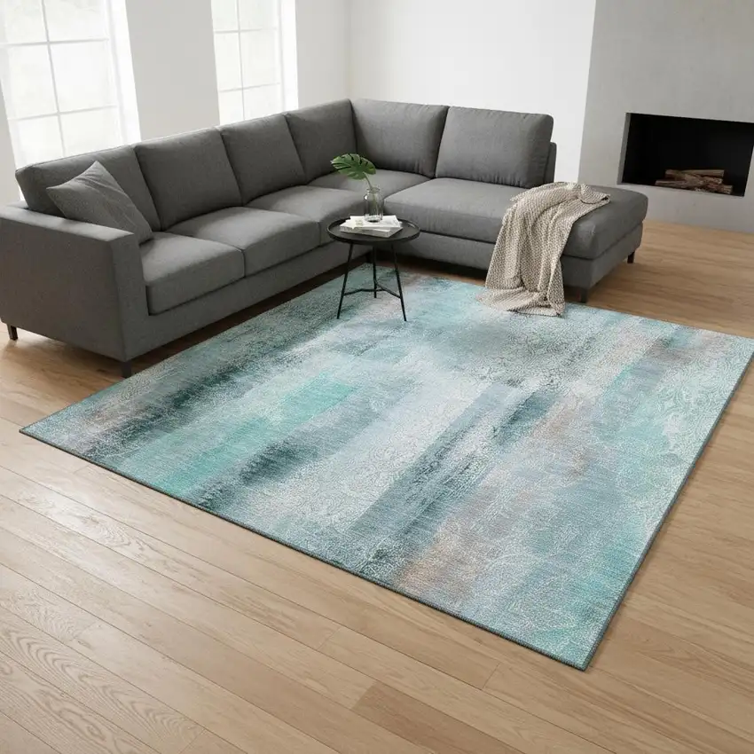 Teal And Ivory Abstract Washable Area Rug With UV Protection Photo 2