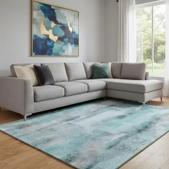 Teal And Ivory Abstract Washable Area Rug With UV Protection Photo 1