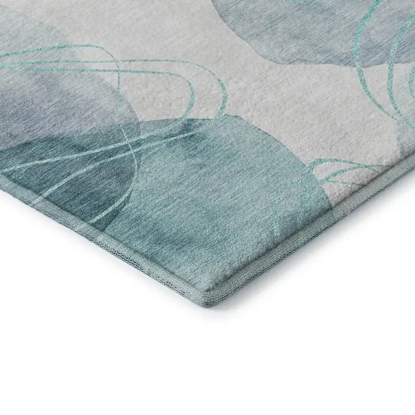 Teal And Ivory Abstract Washable Area Rug With UV Protection Photo 8