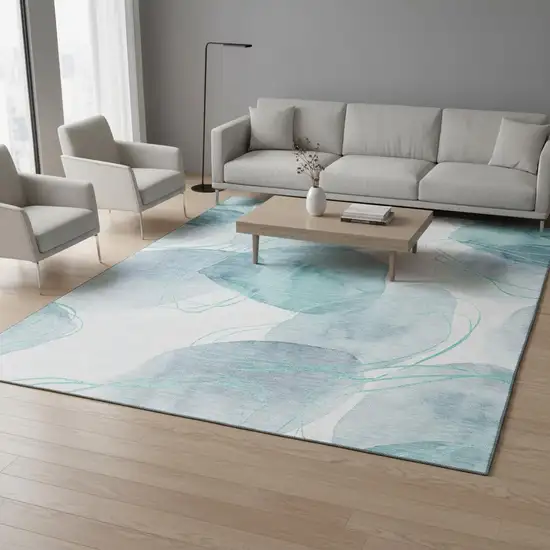 Teal And Ivory Abstract Washable Area Rug With UV Protection Photo 2