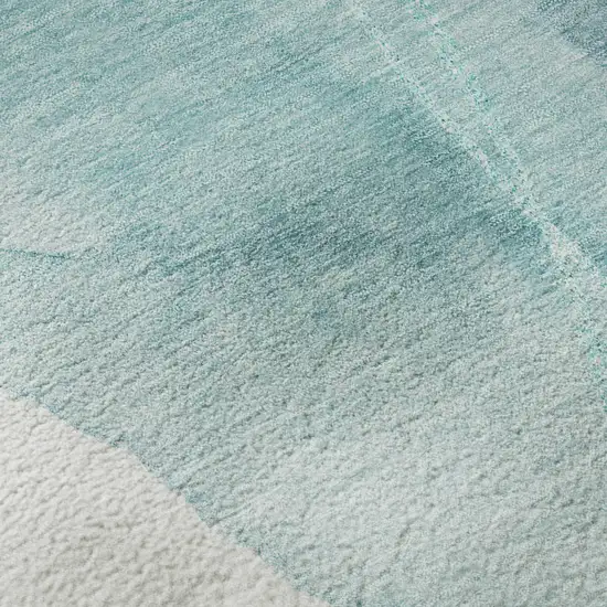 Teal And Ivory Abstract Washable Area Rug With UV Protection Photo 3