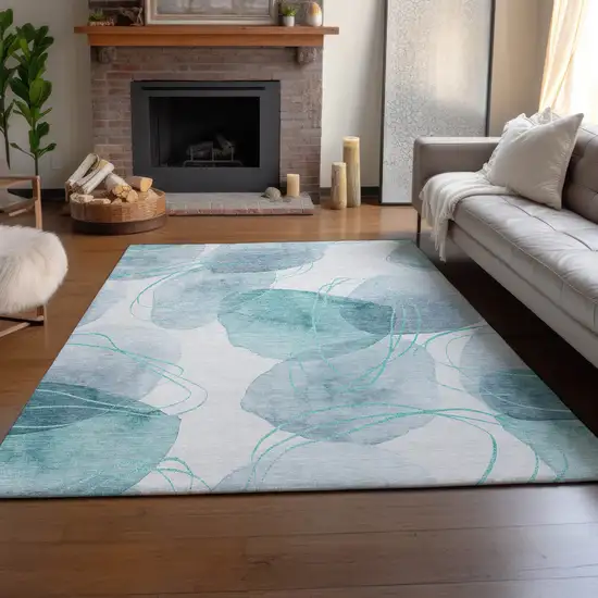 Teal And Ivory Abstract Washable Area Rug With UV Protection Photo 5