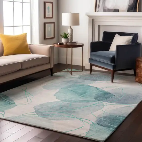 Teal And Ivory Abstract Washable Area Rug With UV Protection Photo 5