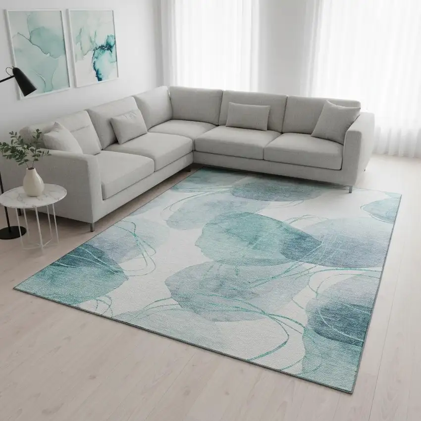 Teal And Ivory Abstract Washable Area Rug With UV Protection Photo 2