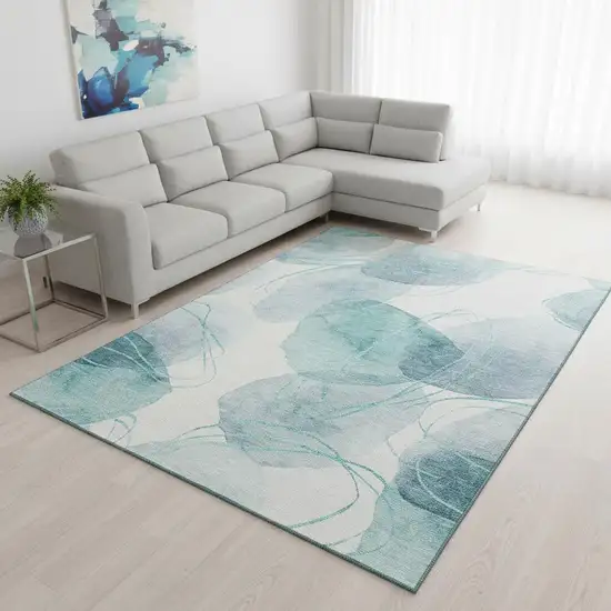 Teal And Ivory Abstract Washable Area Rug With UV Protection Photo 2