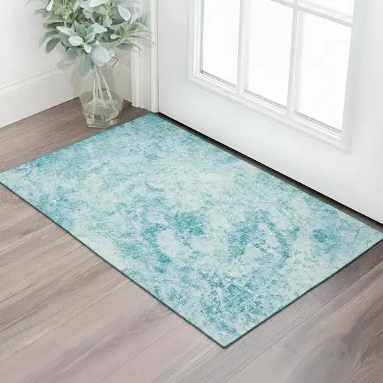 Teal And Ivory Abstract Washable Area Rug With UV Protection Photo 1