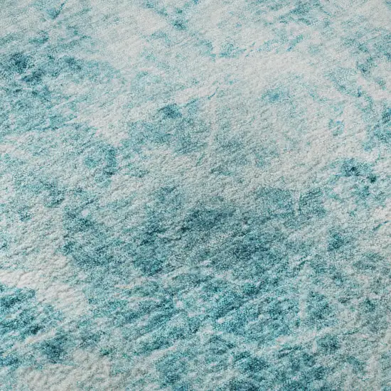 Teal And Ivory Abstract Washable Area Rug With UV Protection Photo 9
