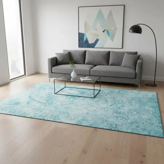 Teal And Ivory Abstract Washable Area Rug With UV Protection Photo 2