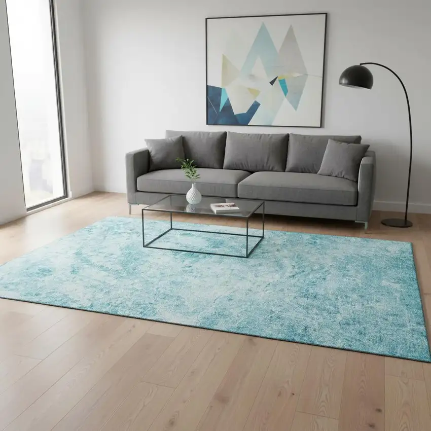 Teal And Ivory Abstract Washable Area Rug With UV Protection Photo 2