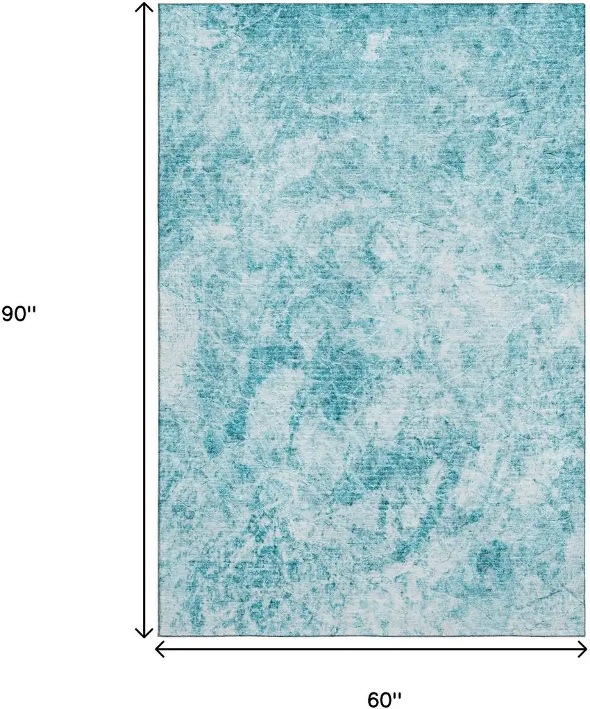 Teal And Ivory Abstract Washable Area Rug With UV Protection Photo 3