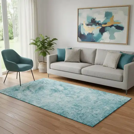 Teal And Ivory Abstract Washable Area Rug With UV Protection Photo 1