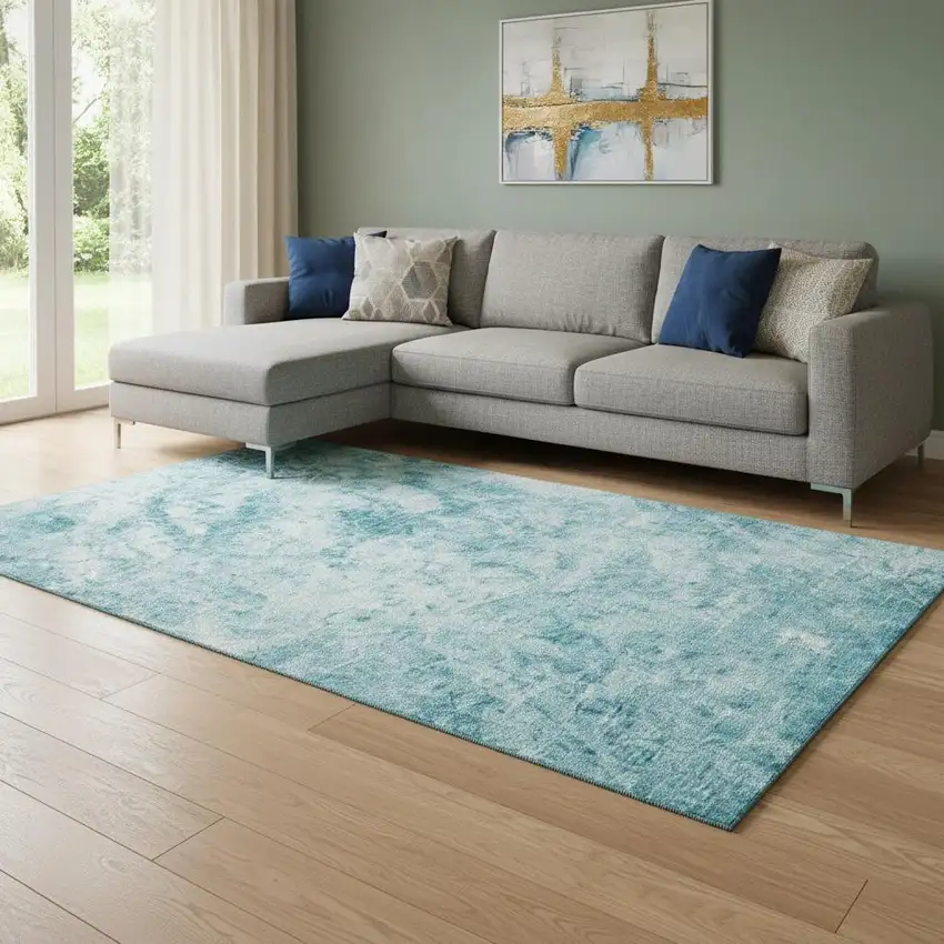 Teal And Ivory Abstract Washable Area Rug With UV Protection Photo 1