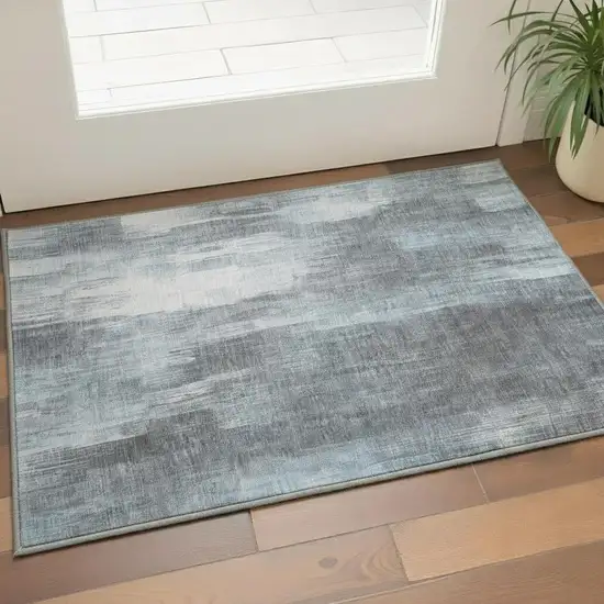 Teal And Ivory Abstract Washable Area Rug With UV Protection Photo 2